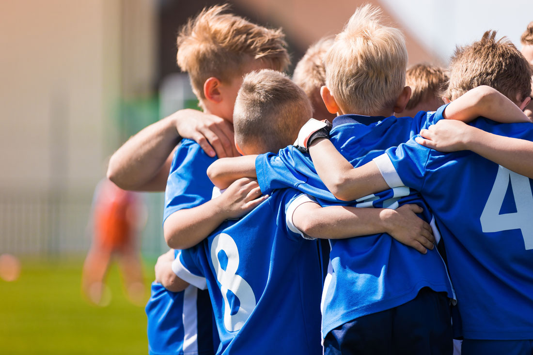 little-boys-soccer-huddle